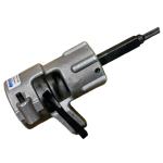 Pneumatic air hammer with a chisel bit and an attached air hose, used for chiseling metal inside a workshop.